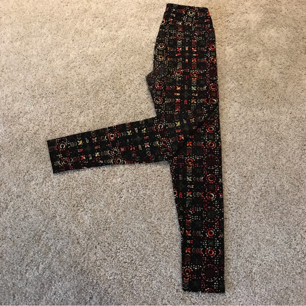 LuLaRoe One Size Leggings in an Aztec like print.